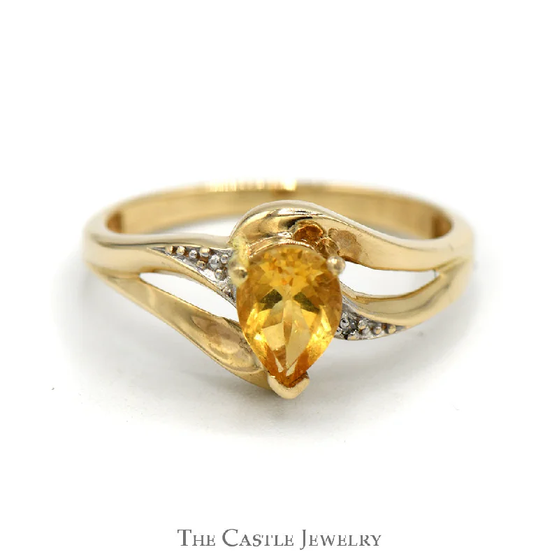 ladies rings with pearl accent -Dainty Pear Shaped Citrine Ring in Gold Crossover Diamond Illusion Mounting