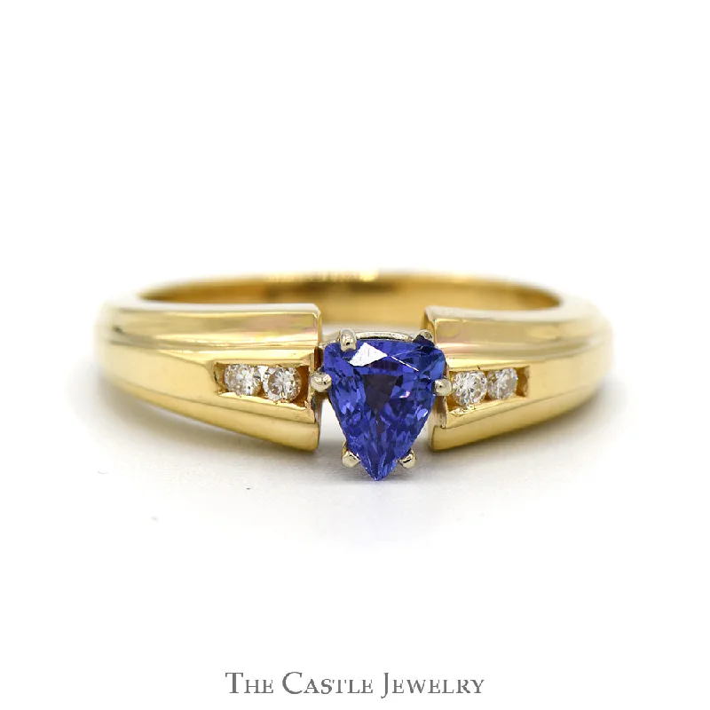 ladies rings with sapphire blue -Trillion Cut Tanzanite Ring with Channel Set Diamond Accents in 14k Yellow Gold