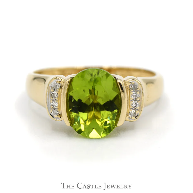 ladies rings classic timeless beauty -Oval Peridot Ring with Vertical Set Diamond Accents in 14k Yellow Gold