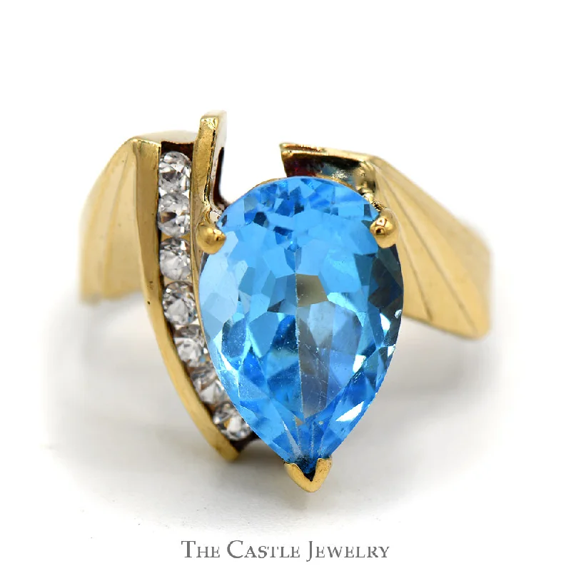 ladies rings with topaz blue -Pear Topaz Ring with Unique Design Cubic Zirconia Mounting