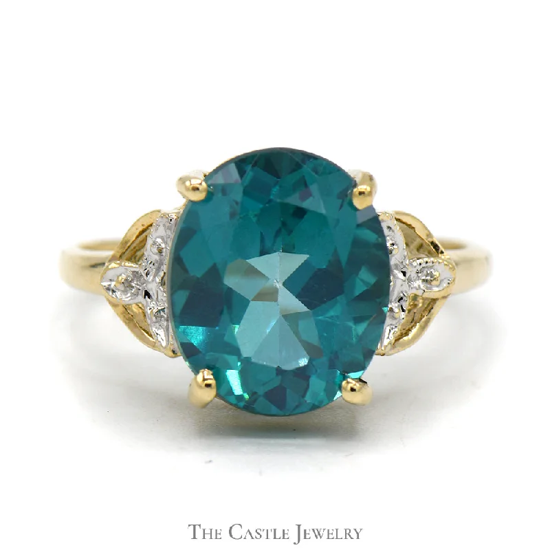 ladies rings with birthstone charm -Oval Blue Nile Topaz Ring with Illusion Set Diamond Accents in 10k Yellow Gold