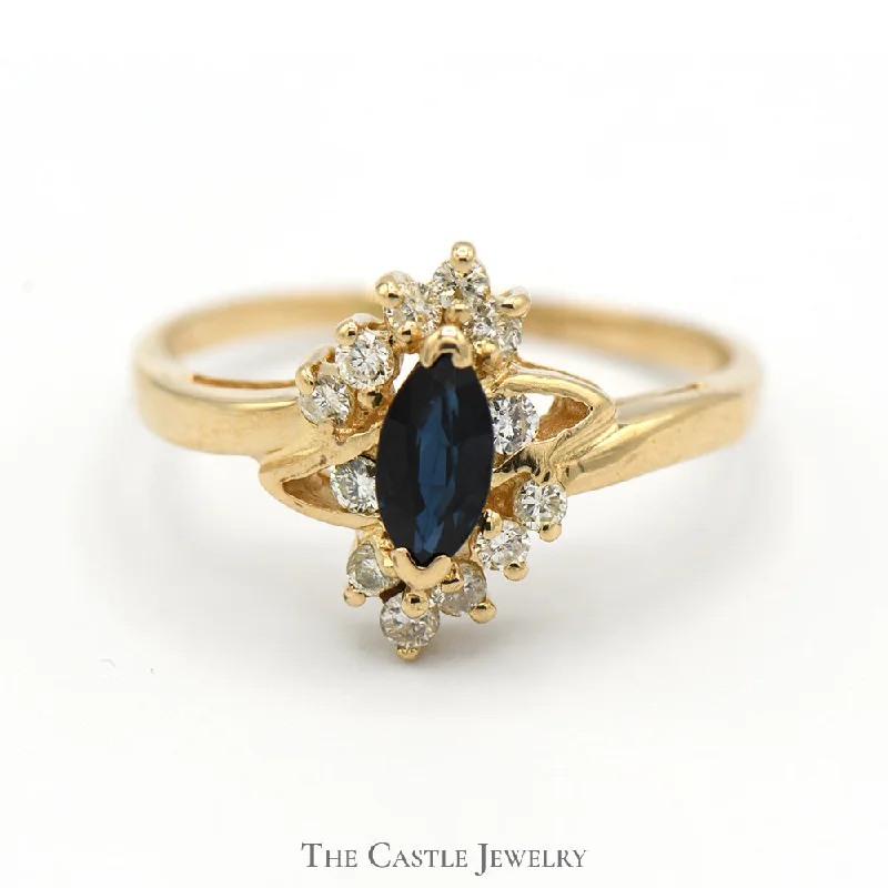 ladies rings with arrow design -Marquise Cut Sapphire Ring with Diamond Accents in 14k Yellow Gold Bypass Mounting