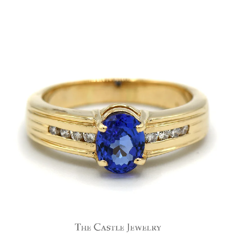 ladies rings art deco flair -Oval Tanzanite Ring with Channel Set Round Diamond Accents in 14K Yellow Gold