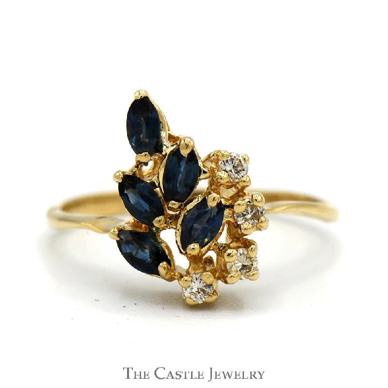 ladies rings with blue sapphire -Marquise Cut Sapphire & Round Diamond Cluster Ring in 14k Yellow Gold