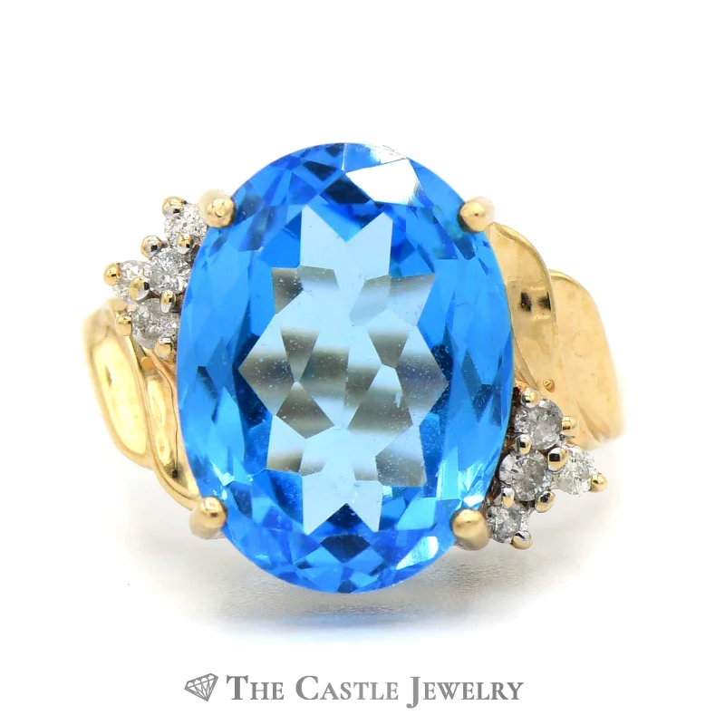 ladies rings simple chic elegance -Oval Blue Topaz Ring with Diamond Accents in 10k Yellow Gold