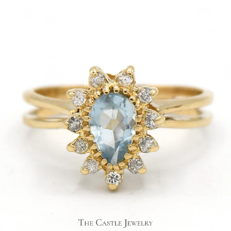 ladies rings with opal glow -Pear Shaped Aquamarine Ring with Diamond Halo in 10k Yellow Gold Split Shank Setting