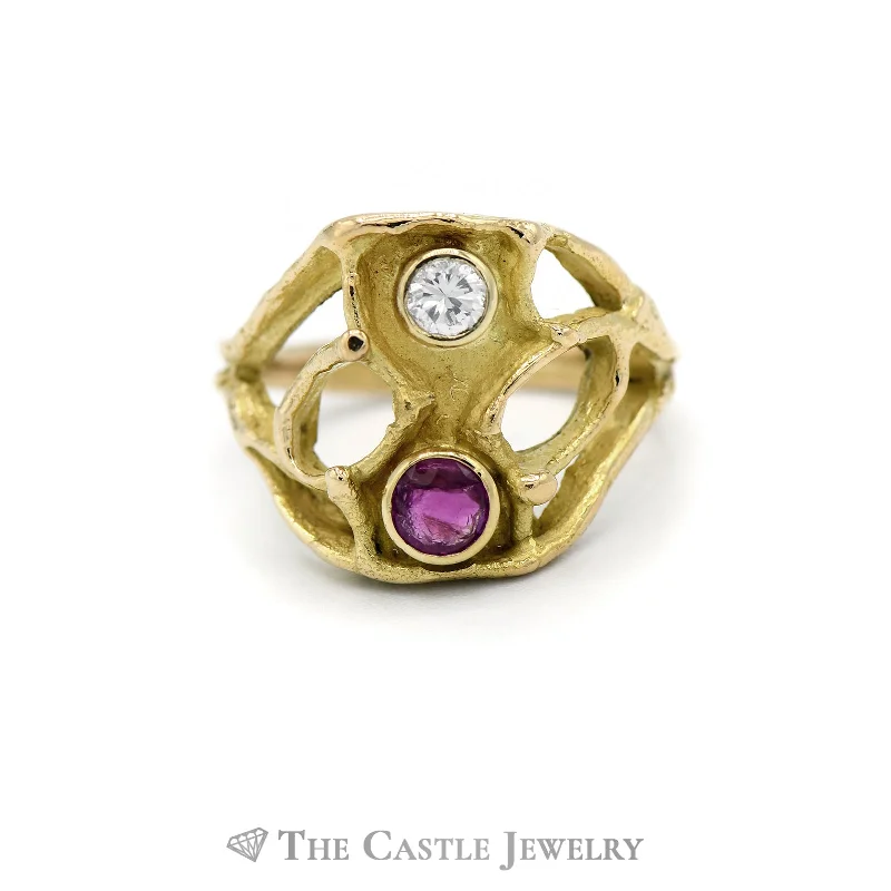 ladies rings hypoallergenic material -Bezel Set Round Ruby and Diamond Ring with Open Design Mounting in 18KT Yellow Gold