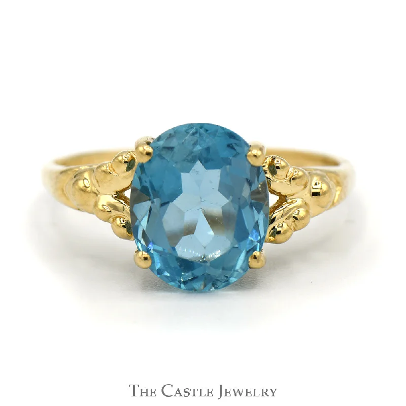 ladies rings with yellow citrine -Oval Blue Topaz Ring with Beaded Split Sides in 14k Yellow Gold