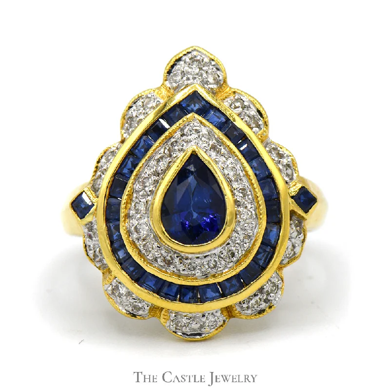 ladies rings delicate heart shape -Pear Shaped Sapphire Ring with Diamond & Sapphire Halo in 18k Yellow Gold