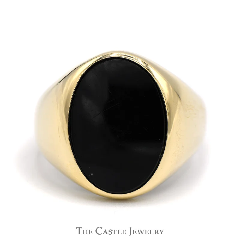 ladies rings with onyx black -Oval Cut Black Onyx Signet Ring in 10k Yellow Gold Tapered Mounting