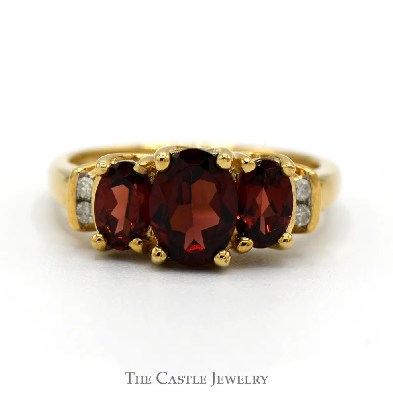 ladies rings with topaz blue -3 Stone Oval Garnet Ring with Diamond Accents in 10k Yellow Gold