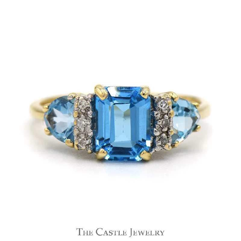 ladies rings for bold fashion -Emerald Cut Blue Topaz Ring with Trillion Cut Sides and Diamond Accents in 10k Yellow Gold