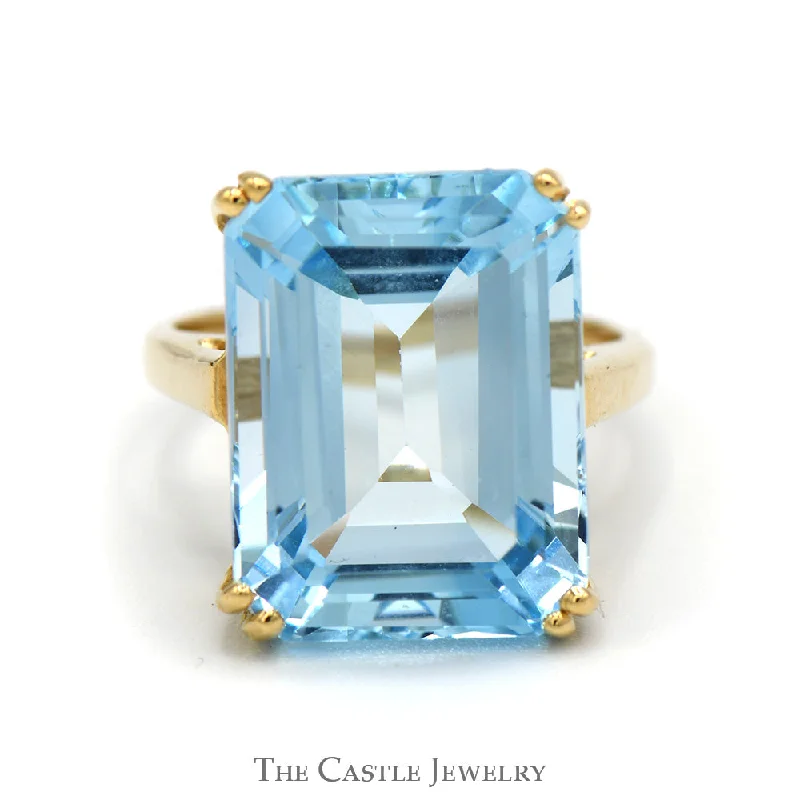 ladies rings layered stackable look -Emerald Cut Blue Topaz Ring in 10k Yellow Gold Cathedral Mounting