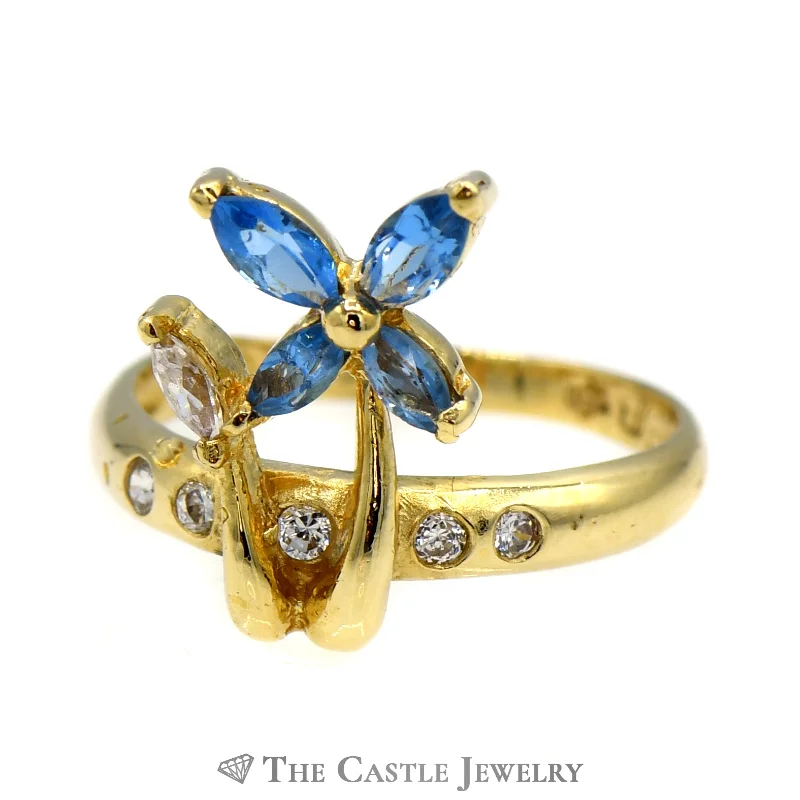 ladies rings with garnet red -Blue Topaz & Cubic Zirconia Flower Designed Ring in 18k Yellow Gold