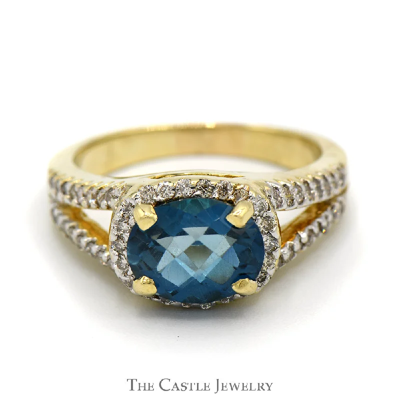 ladies rings for office style -Oval Fantasy Cut Blue Topaz Ring with Diamond Accents in 14k Yellow Gold Split Shank Setting